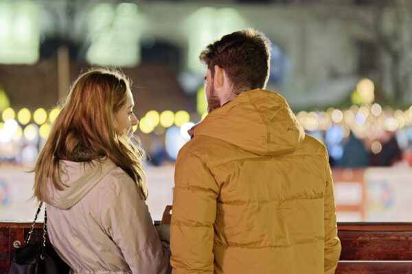 merry christmas, couple, young people, people, blonde, friendship, together, talking, fence, winter, holiday, lights, ornaments, decoration