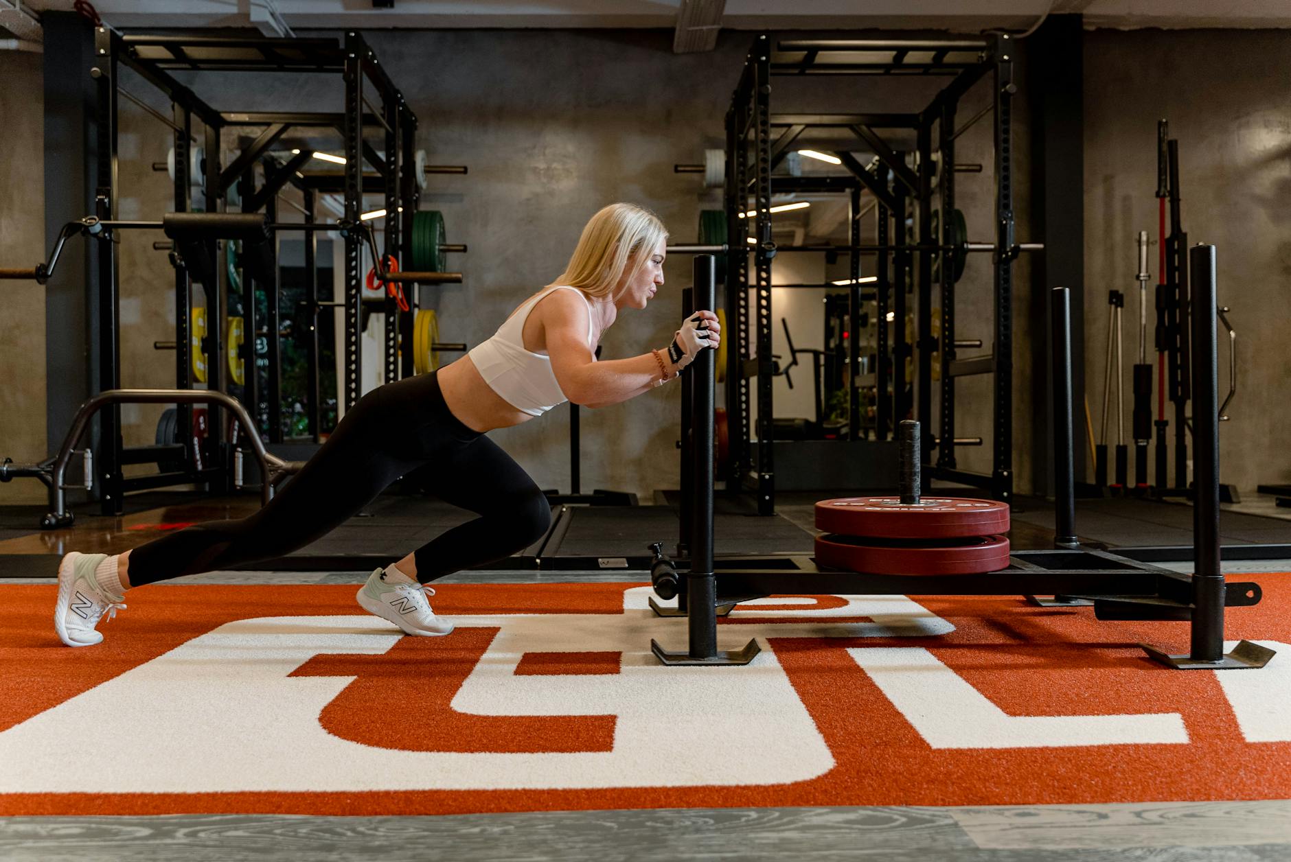 Caucasian Women with White Hair Performing Prowler Workouts